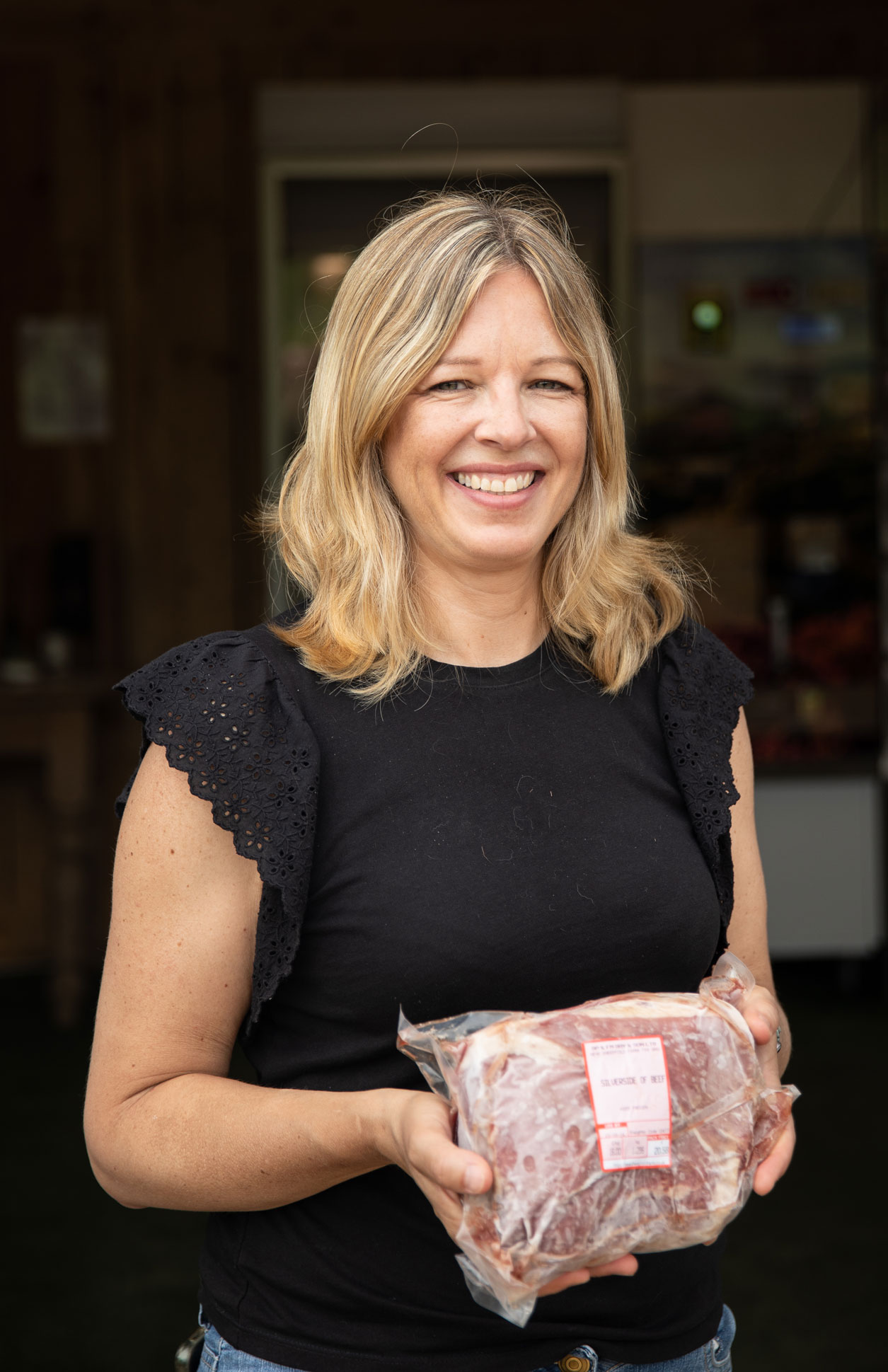 Person holding packaged beef recently taken from a fridge. Credit Charlie Fox.