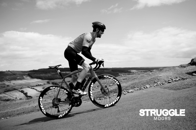 Cycling climbing hill in North York Moors credit Strugle events